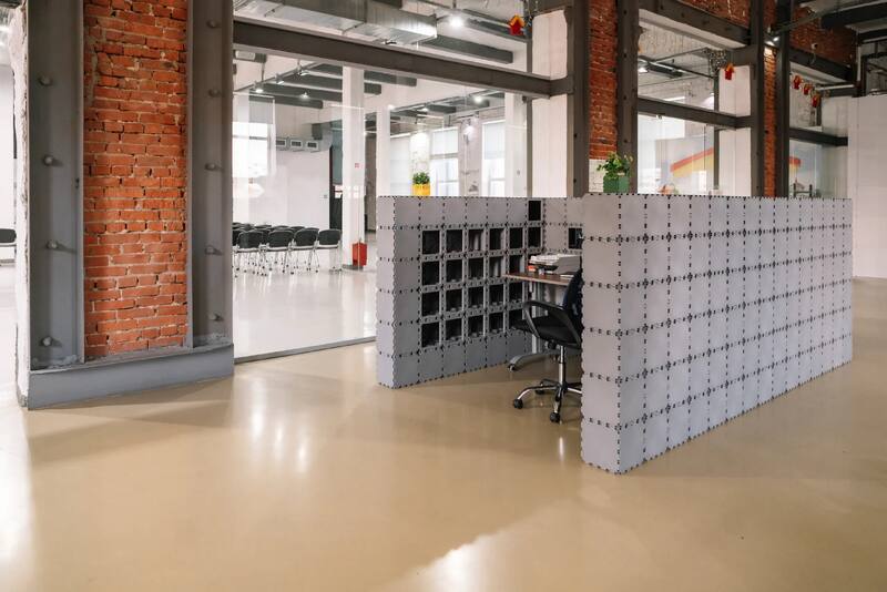 Gray Cubik booth standing in a bright loft