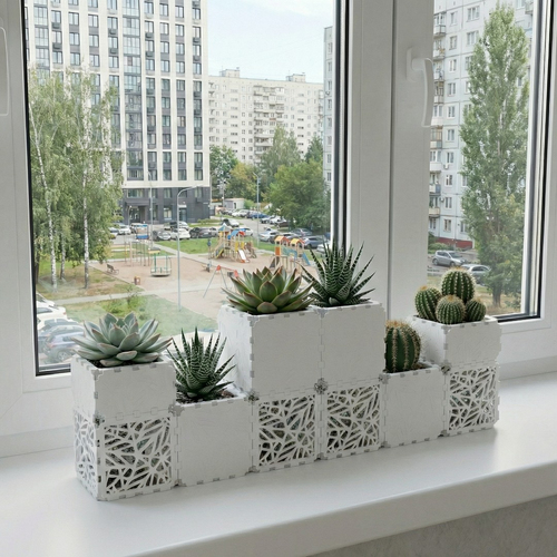 White Cubik table garden set with cacti on a windowsill