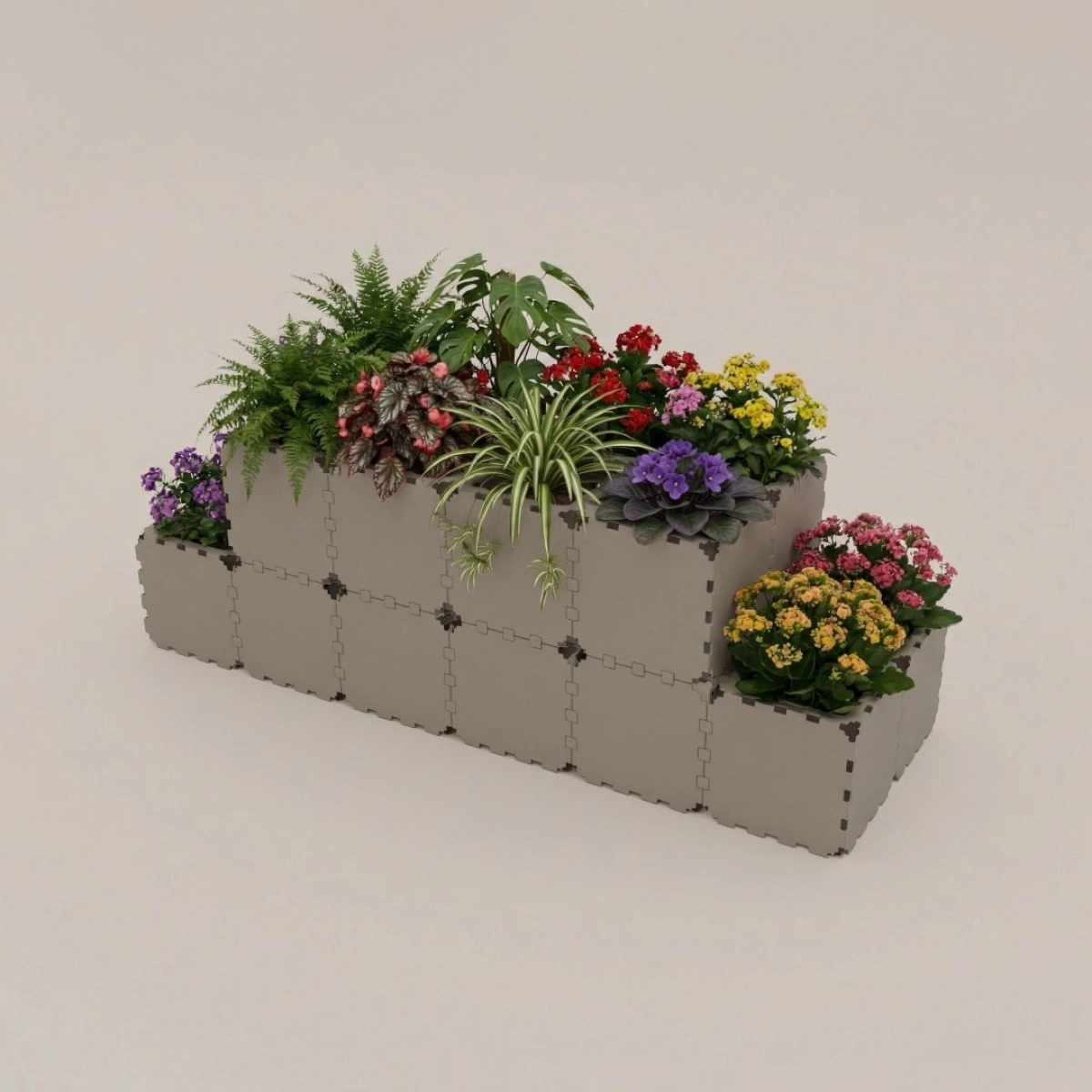 Grey Cubik modular tiered planter with flowers, studio view